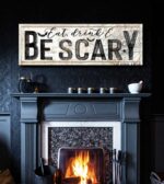 Eat Drink & Be Scary Sign handmade by ToeFishArt. Original, custom, personalized wall decor signs. Canvas, Wood or Metal. Rustic modern farmhouse, cottagecore, vintage, retro, industrial, Americana, primitive, country, coastal, minimalist.