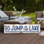 Go Jump in the Lake Outdoor Metal or Canvas Sign handmade by ToeFishArt. Original, custom, personalized wall decor signs. Canvas, Wood or Metal. Rustic modern farmhouse, cottagecore, vintage, retro, industrial, Americana, primitive, country, coastal, minimalist.