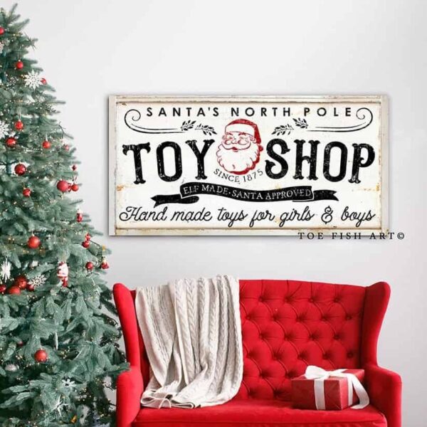 Santa's North Pole Toy Shop Sign handmade by ToeFishArt. Original, custom, personalized wall decor signs. Canvas, Wood or Metal. Rustic modern farmhouse, cottagecore, vintage, retro, industrial, Americana, primitive, country, coastal, minimalist.
