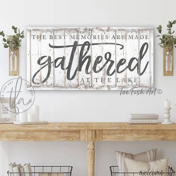 ToeFishArt The Best Memories are Made Gathered at the Lake Sign with white, navy and blue color options, Indoor-Outdoor Metal or Canvas, rustic coastal farmhouse sign handmade by ToeFishArt. Outdoor Exterior Commercial-Grade durable Metal Sign handmade in the USA and built to last a lifetime by the Toe Fish Art family artisans. Unique eye-catching decor indoors or outdoor curb appeal. Original, custom, personalized wall decor signs. Canvas, Wood or Metal. Rustic modern farmhouse, cottagecore, vintage, retro, industrial, Americana, primitive, country, coastal, minimalist.