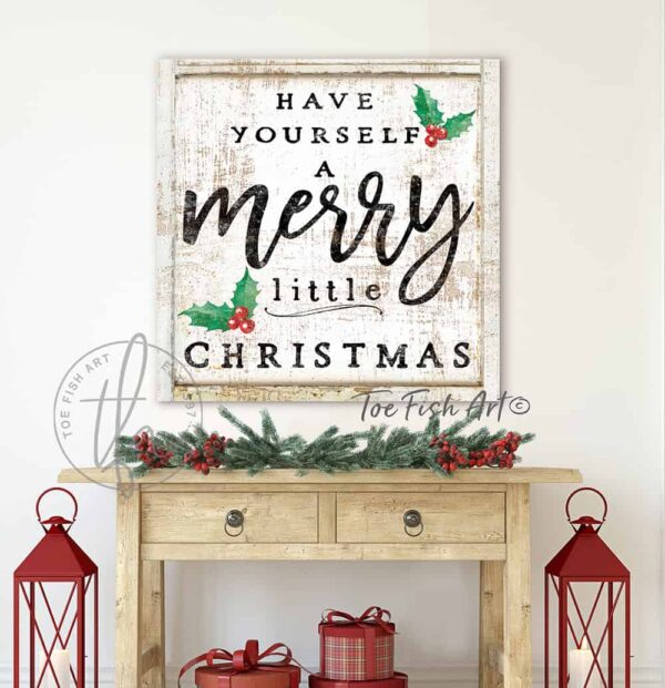 Toe Fish Art Vintage "Have Yourself a Merry Little Christmas" Rustic Cottage Christmas Winter Holiday Season Wall Decoration square-shaped sign. Winter Holiday Seasonal Wall Decor painting. Primitive Country Christmas sign handcrafted in durable high-quality stretched canvas, or framed canvas with choice of frame colors, or outdoor weatherproof solid aluminum metal, handmade in the USA from start to finish! Beautiful, nostalgic and timeless seasonal holiday wall decor. Handcrafted in the USA by ToeFishArt, and built to last a lifetime by the Toe Fish Art family artisans. This beautifully designed festive sign comes in three color styles to fit your style: Timeworn White, Rustic White or Rustic Black, all with the favorite saying "Have Yourself a Merry Little Christmas" adorned with red and green holly berries and leaves. This sign adds unique eye-catching decor indoors or outdoors. Add instant outdoor holiday curb appeal! Christmas welcome entryway porch or living room fireplace hearth or fireplace mantel wall hanging or shelf sitter. Original, custom, personalized wall decor signs. Canvas, Wood or Metal. Rustic modern farmhouse, cottagecore, vintage, retro, industrial, Americana, primitive, country, coastal, minimalist. Toe Fish Art is a USA small family woman owned business making beautiful decor since 1997.