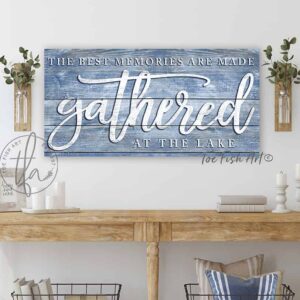 ToeFishArt The Best Memories are Made Gathered at the Lake Sign with white, navy and blue color options, Indoor-Outdoor Metal or Canvas, rustic coastal farmhouse sign handmade by ToeFishArt. Outdoor Exterior Commercial-Grade durable Metal Sign handmade in the USA and built to last a lifetime by the Toe Fish Art family artisans. Unique eye-catching decor indoors or outdoor curb appeal. Original, custom, personalized wall decor signs. Canvas, Wood or Metal. Rustic modern farmhouse, cottagecore, vintage, retro, industrial, Americana, primitive, country, coastal, minimalist.