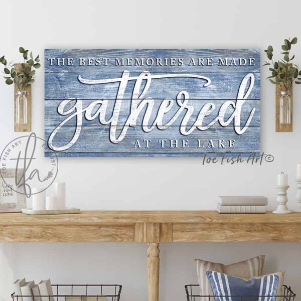 ToeFishArt The Best Memories are Made Gathered at the Lake Sign with white, navy and blue color options, Indoor-Outdoor Metal or Canvas, rustic coastal farmhouse sign handmade by ToeFishArt. Outdoor Exterior Commercial-Grade durable Metal Sign handmade in the USA and built to last a lifetime by the Toe Fish Art family artisans. Unique eye-catching decor indoors or outdoor curb appeal. Original, custom, personalized wall decor signs. Canvas, Wood or Metal. Rustic modern farmhouse, cottagecore, vintage, retro, industrial, Americana, primitive, country, coastal, minimalist.