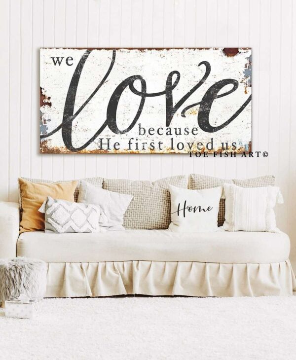 We Love Because He First Loved Us Sign handmade by ToeFishArt. Original, custom, personalized wall decor signs. Canvas, Wood or Metal. Rustic modern farmhouse, cottagecore, vintage, retro, industrial, Americana, primitive, country, coastal, minimalist.