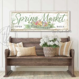 Spring Market Fresh Flower Bouquet Cursive Sign handmade by ToeFishArt hanging above amish wooden bench against creamy white vertical shiplap wall. Original, custom, personalized gifts and wall decor signs. Canvas, Wood or Metal. Rustic modern farmhouse, cottagecore, vintage, retro, industrial, Americana, primitive, country, coastal, minimalist.