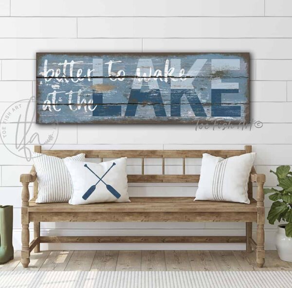 ToeFishArt Better to Wake at the Lake rustic coastal farmhouse sign, in beautiful vintage blues, handmade by ToeFishArt. Original, custom, personalized wall decor signs. Canvas, Wood or Metal. Rustic modern farmhouse, cottagecore, vintage, retro, industrial, Americana, primitive, country, coastal, minimalist.