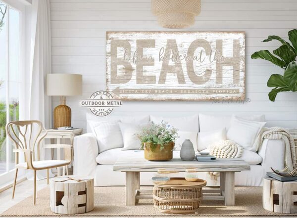 ToeFishArt Life is Better at the Beach Outdoor Metal or Canvas Personalize-able rustic coastal farmhouse sign, in beautiful vintage beach cottage sandy tan and distressed white, handmade by ToeFishArt. Outdoor Exterior Commercial-Grade durable Metal Sign handmade in the USA and built to last a lifetime by the Toe Fish Art family artisans. Add your custom Beach Name and City, State to this beautiful beachy artwork for unique eye-catching decor indoors or outdoor curb appeal. Original, custom, personalized wall decor signs. Canvas, Wood or Metal. Rustic modern farmhouse, cottagecore, vintage, retro, industrial, Americana, primitive, country, coastal, minimalist.