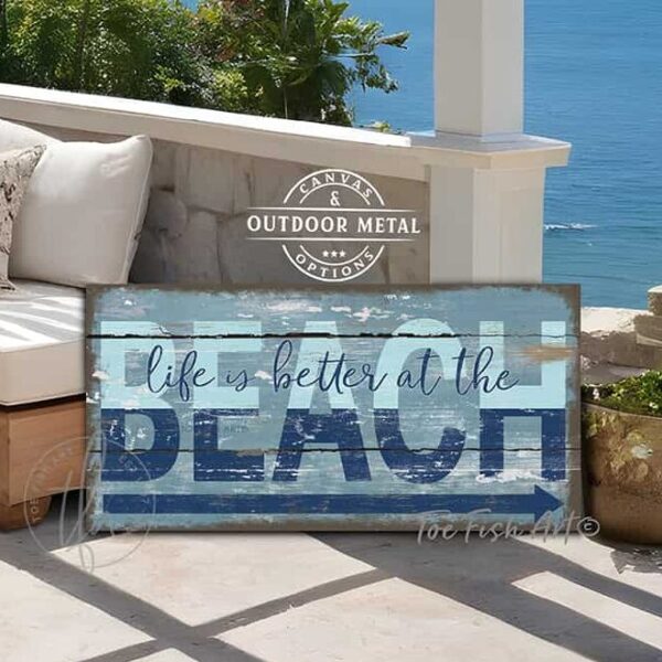 ToeFishArt Life is Better at the Beach Outdoor Metal or Canvas Personalize-able rustic coastal farmhouse sign, in beautiful vintage beach cottage ocean blues and nautical navy blue, handmade by ToeFishArt. Outdoor Exterior Commercial-Grade durable Metal Sign handmade in the USA and built to last a lifetime by the Toe Fish Art family artisans. Add your custom Beach Name and City, State to this beautiful blue and white artwork for unique eye-catching decor indoors or outdoor curb appeal. Original, custom, personalized wall decor signs. Canvas, Wood or Metal. Rustic modern farmhouse, cottagecore, vintage, retro, industrial, Americana, primitive, country, coastal, minimalist.