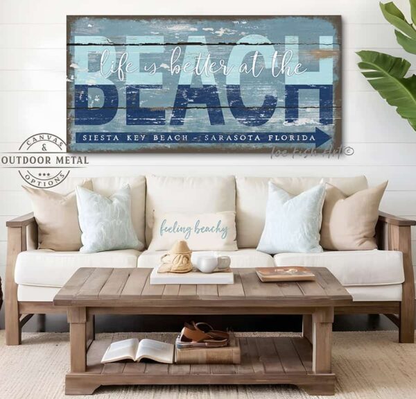 ToeFishArt Life is Better at the Beach Outdoor Metal or Canvas Personalize-able rustic coastal farmhouse sign, in beautiful vintage beach cottage ocean blues and distressed white, handmade by ToeFishArt. Outdoor Exterior Commercial-Grade durable Metal Sign handmade in the USA and built to last a lifetime by the Toe Fish Art family artisans. Add your custom Beach Name and City, State to this beautiful blue and white artwork for unique eye-catching decor indoors or outdoor curb appeal. Original, custom, personalized wall decor signs. Canvas, Wood or Metal. Rustic modern farmhouse, cottagecore, vintage, retro, industrial, Americana, primitive, country, coastal, minimalist.