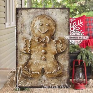 Toe Fish Art Vintage Gingerbread Man and Woman Artwork, Rustic Cottage Country Christmas Holiday Winter Seasonal Wall Decor vertical signs, handmade in the USA from start to finish! Stylish and timeless seasonal winter wall decor. Handmade in the USA by ToeFishArt, and built to last a lifetime by the Toe Fish Art family artisans. This sweet gingerbread couple brings nostalgic Christmas magic to your cozy kitchen or fireplace mantel. Toe Fish Art's original painting adds unique eye-catching decor indoors or outdoors. Great outdoor holiday curb appeal! Christmas welcome entryway porch or living room fireplace hearth or mantel wall hanging or shelf sitter. Original, custom, personalized wall decor signs. Canvas, Wood or Metal. Rustic modern farmhouse, cottagecore, vintage, retro, industrial, Americana, primitive, country, coastal, minimalist.