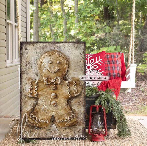 Toe Fish Art Vintage Gingerbread Man and Woman Artwork, Rustic Cottage Country Christmas Holiday Winter Seasonal Wall Decor vertical signs, handmade in the USA from start to finish! Stylish and timeless seasonal winter wall decor. Handmade in the USA by ToeFishArt, and built to last a lifetime by the Toe Fish Art family artisans. This sweet gingerbread couple brings nostalgic Christmas magic to your cozy kitchen or fireplace mantel. Toe Fish Art's original painting adds unique eye-catching decor indoors or outdoors. Great outdoor holiday curb appeal! Christmas welcome entryway porch or living room fireplace hearth or mantel wall hanging or shelf sitter. Original, custom, personalized wall decor signs. Canvas, Wood or Metal. Rustic modern farmhouse, cottagecore, vintage, retro, industrial, Americana, primitive, country, coastal, minimalist.