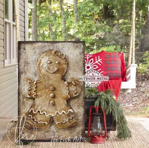 Toe Fish Art Vintage Gingerbread Man and Woman Artwork, Rustic Cottage Country Christmas Holiday Winter Seasonal Wall Decor vertical signs, handmade in the USA from start to finish! Stylish and timeless seasonal winter wall decor. Handmade in the USA by ToeFishArt, and built to last a lifetime by the Toe Fish Art family artisans. This sweet gingerbread couple brings nostalgic Christmas magic to your cozy kitchen or fireplace mantel. Toe Fish Art's original painting adds unique eye-catching decor indoors or outdoors. Great outdoor holiday curb appeal! Christmas welcome entryway porch or living room fireplace hearth or mantel wall hanging or shelf sitter. Original, custom, personalized wall decor signs. Canvas, Wood or Metal. Rustic modern farmhouse, cottagecore, vintage, retro, industrial, Americana, primitive, country, coastal, minimalist.