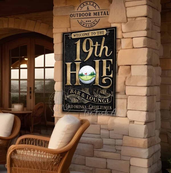 Toe Fish Art's vertical 19th Hole Bar & Lounge Golf Sign handcrafted to-order in the USA for you in Canvas or Outdoor Weatherproof Metal. Personalize-able golf enthusiast gift decor with your family name, personal name, favorite saying or Welcome phrase. Swanky and stylish vibrant colors to enhance your decor - Vintage Slate Black with Rustic Gold Lettering. Custom quote options available upon request. This is the perfect piece for your indoor pub bar area or outdoor watering hole after finishing the back nine! This special sign is a birdie for gifting to the golf enthusiasts in your life. Live on a gorgeous green golf course? This decor is perfect for your patio, porch, deck, lanai, pergola, outdoor kitchen & bar area, game room, bar & lounge or favorite entertaining space inside or outside! Handmade to-order in the USA by American small family woman-owned company ToeFishArt, doing business since 1997. Personalized Canvas or Outdoor Exterior Commercial-Grade Metal Sign handmade in the USA and built to last a lifetime by Toe Fish Art. Add your personal name, established date, or catch phrase to this beautiful artwork for unique, eye-catching appeal indoors or for your outdoor hangout space. Color options available too! Thousands of five star reviews! Featured in Better Homes & Gardens, Cottages & Bungalows, and Farmhouse Style magazines. We make original, custom, personalized wall decor signs and wall art. Handcrafted in your choice of canvas, framed canvas, shiplap hardwood or outdoor metal. Choose from rustic, modern cottage farmhouse, cottagecore, vintage, retro, industrial, Americana, primitive, country, coastal and minimalist contemporary styles.