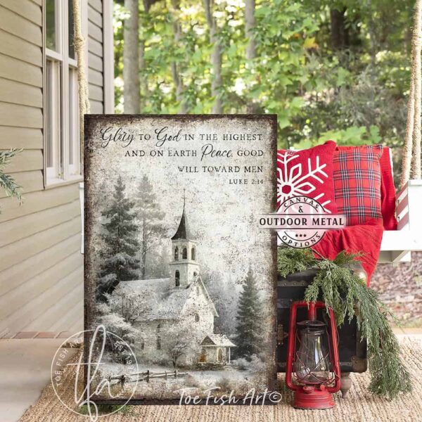 Toe Fish Art Vintage Christmas Religious Christian Scripture Bible Verse Luke 2:14 Glory to God in the Highest Peace on Earth Goodwill Toward Men sign with snowy country forest church painting vertical design. Rustic Primitive Country Cottage Christmas vertical wall art handcrafted in durable high-quality canvas or outdoor weatherproof solid aluminum metal, handmade in the USA from start to finish! Beautiful, stylish and timeless seasonal winter wall decor. Handcrafted in the USA by ToeFishArt, and built to last a lifetime by the Toe Fish Art family artisans. This beautiful original nostalgic winter landscape church scene adds unique eye-catching decor indoors or outdoors. Add instant outdoor holiday curb appeal! Christmas welcome entryway porch or living room fireplace hearth or mantel wall hanging or shelf sitter. Original, custom, personalized wall decor signs. Canvas, Wood or Metal. Rustic modern farmhouse, cottagecore, vintage, retro, industrial, Americana, primitive, country, coastal, minimalist. Toe Fish Art is a USA small family woman owned business making beautiful decor since 1997.