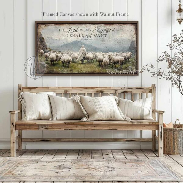 Toe Fish Art's artisan-made, faith-based, framed canvas or outdoor waterproof metal wall decor, expertly made with American-sourced materials. This premium, handcrafted piece features the painting of a shepherd dressed in flowing white garments walking peacefully among a herd of sheep in a lush green meadow. The scene is surrounded by majestic rocky mountains under a vibrant blue sky filled with puffy white and gray clouds, evoking a serene and pastoral atmosphere, with the hand-lettered Bible verse 'The Lord is My Shepherd I Shall Not Want' – Psalm 23:1. Built to last with genuine craftsmanship, this relevant decor adds rustic charm and heritage quality to any space. Made in the USA with durable, authentic materials for a beautiful and meaningful display. Rustic country charm meets Modern Farmhouse Cottagecore wall decor handcrafted in durable high-quality framed canvas or outdoor weatherproof solid aluminum metal, handmade in the USA from start to finish! Beautiful, stylish and timeless wall decor painting. Handcrafted in the USA by ToeFishArt, and built to last a lifetime by the Toe Fish Art family artisans. This beautiful original artwork adds unique eye-catching decor indoors or outdoors. Add instant outdoor curb appeal to your home or vacation house entryway! Perfect for your porch, entryway, patio, lanai, deck, garden, veranda, living room, fireplace hearth or mantel, wall hanging or shelf sitter, dining room, kitchen or bedroom. This painting is a beautiful reminder of Christian faith and God's love. Original, custom, personalized wall decor signs. Canvas, Wood or Metal. Rustic modern farmhouse, cottagecore, vintage, retro, industrial, Americana, primitive, country, coastal, minimalist. Toe Fish Art is a USA small family woman owned business making beautiful decor since 1997.