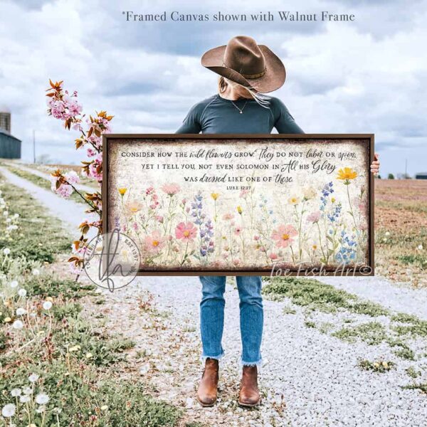 Toe Fish Art's artisan-made framed canvas or outdoor waterproof metal wall decor, expertly made with American-sourced materials. This premium, handcrafted piece features a timeless painting of pastel wildflowers with the hand-lettered Bible verse ‘Consider how the wildflowers grow’ (Luke 12:27). Built to last with genuine craftsmanship, it adds rustic charm and heritage quality to any space. Made in the USA with durable, authentic materials for a beautiful and meaningful display. Rustic Country and Modern Farmhouse wall decor handcrafted in durable high-quality framed canvas or outdoor weatherproof solid aluminum metal, handmade in the USA from start to finish! Beautiful, stylish and timeless floral wall decor painting. Handcrafted in the USA by ToeFishArt, and built to last a lifetime by the Toe Fish Art family artisans. This beautiful original artwork adds unique eye-catching decor indoors or outdoors. Add instant outdoor curb appeal to your home or vacation house entryway! Perfect for your porch, entryway, patio, lanai, deck, garden, veranda, living room, fireplace hearth or mantel, wall hanging or shelf sitter, dining room or bedroom. This painting is a beautiful reminder of Christian faith and God's love with the promise of Spring renewal. Original, custom, personalized wall decor signs. Canvas, Wood or Metal. Rustic modern farmhouse, cottagecore, vintage, retro, industrial, Americana, primitive, country, coastal, minimalist. Toe Fish Art is a USA small family woman owned business making beautiful decor since 1997.