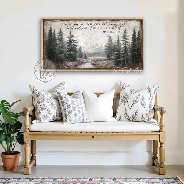 Toe Fish Art's artisan-made framed canvas or outdoor waterproof metal wall decor, expertly made with American-sourced materials. This premium, handcrafted piece features a timeless landscape scenery painting of a serene mountain river weaving through a peaceful forest, with the hand-lettered Scripture Bible verse 'Come To Me All Who Are Weary & I Will Give You Rest' – Matthew 11:28. Built to last with genuine craftsmanship, it adds rustic charm and heritage quality to any space. Made in the USA with durable, authentic materials for a beautiful and meaningful display. Rustic Country meets Modern Farmhouse Cottagecore wall decor handcrafted in durable high-quality framed canvas or outdoor weatherproof solid aluminum metal, handmade in the USA from start to finish! Beautiful, stylish and timeless wall decor painting. Handcrafted in the USA by ToeFishArt, and built to last a lifetime by the Toe Fish Art family artisans. This beautiful original artwork adds unique eye-catching decor indoors or outdoors. Add instant outdoor curb appeal to your home or vacation house entryway! Perfect for your porch, entryway, patio, lanai, deck, garden, veranda, living room, fireplace hearth or mantel, wall hanging or shelf sitter, dining room or bedroom. This painting is a beautiful reminder of Christian faith and God's love. Original, custom, personalized wall decor signs. Canvas, Wood or Metal. Rustic modern farmhouse, cottagecore, vintage, retro, industrial, Americana, primitive, country, coastal, minimalist. Toe Fish Art is a USA small family woman owned business making beautiful decor since 1997.