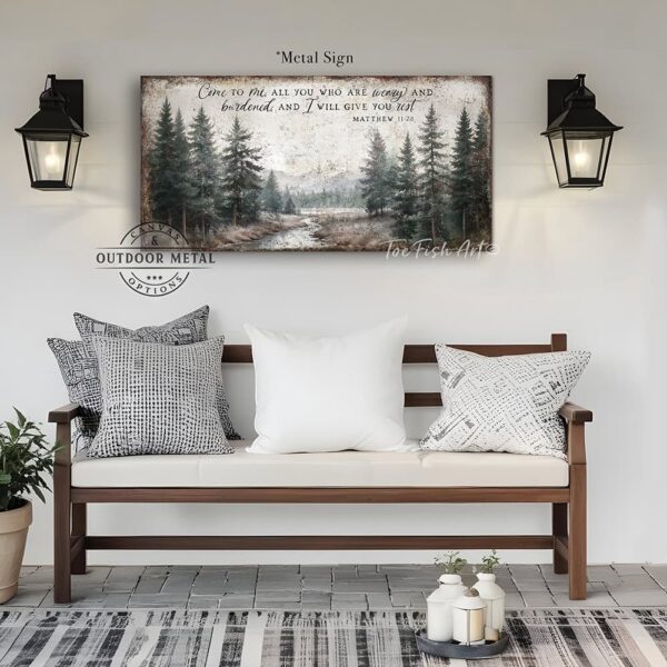 Toe Fish Art's artisan-made framed canvas or outdoor waterproof metal wall decor, expertly made with American-sourced materials. This premium, handcrafted piece features a timeless landscape scenery painting of a serene mountain river weaving through a peaceful forest, with the hand-lettered Scripture Bible verse 'Come To Me All Who Are Weary & I Will Give You Rest' – Matthew 11:28. Built to last with genuine craftsmanship, it adds rustic charm and heritage quality to any space. Made in the USA with durable, authentic materials for a beautiful and meaningful display. Rustic Country meets Modern Farmhouse Cottagecore wall decor handcrafted in durable high-quality framed canvas or outdoor weatherproof solid aluminum metal, handmade in the USA from start to finish! Beautiful, stylish and timeless wall decor painting. Handcrafted in the USA by ToeFishArt, and built to last a lifetime by the Toe Fish Art family artisans. This beautiful original artwork adds unique eye-catching decor indoors or outdoors. Add instant outdoor curb appeal to your home or vacation house entryway! Perfect for your porch, entryway, patio, lanai, deck, garden, veranda, living room, fireplace hearth or mantel, wall hanging or shelf sitter, dining room or bedroom. This painting is a beautiful reminder of Christian faith and God's love. Original, custom, personalized wall decor signs. Canvas, Wood or Metal. Rustic modern farmhouse, cottagecore, vintage, retro, industrial, Americana, primitive, country, coastal, minimalist. Toe Fish Art is a USA small family woman owned business making beautiful decor since 1997.