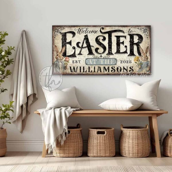 Toe Fish Art's Personalized Easter wall art sign with the text 'Welcome to Easter at the [Your Family Name],' featuring a vintage-style illustration of an antique bunny rabbit couple holding spring flowers, dressed in elegant spring garden party attire. The bunnies are framed by soft pastel accents, set against a worn rustic white wooden background with striking black lettering. This unique decoration is perfect for spring decor, designed for seasonal Easter country cottage display, available in framed canvas or outdoor metal. Toe Fish Art's wall hangings come in a huge variety of sizes and frame colors. This cottage-style artwork is available in framed canvas or waterproof metal, adding a sweet, cozy and warm touch to any space in your home, indoors or outside. Blending rustic primitive country charm with authentic cottage farmhouse style, this unique handcrafted artwork is made of durable high-quality framed canvas or outdoor weatherproof solid aluminum metal, making it perfect for incorporating in any reorganizing, remodeling, redecorating or spring cleaning project, indoors or outdoors. Proudly made in the USA, each piece is designed to last a lifetime by the artisans at Toe Fish Art. This stunning piece enhances any decor, adding special eye-catching holiday curb appeal. Mix and match your Toe Fish Art collection to create the perfect unique touch for your space! This artwork is perfect for display on a porch, entryway, patio, lanai, deck, veranda, living room, fireplace hearth or mantel, dining room, kitchen, or as a shelf sitter in any room. A vibrant reminder of renewal and rebirth for the spring season, this artwork fits various styles, including rustic modern farmhouse, cottagecore, vintage, retro, industrial, Americana, primitive, country, coastal, and minimalist. Toe Fish Art is a small family, woman-owned business, creating beautiful decor for almost three decades, since 1997!