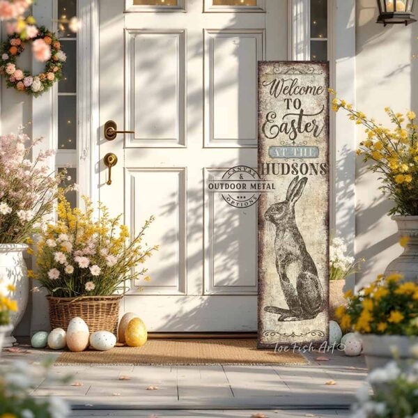 Toe Fish Art vintage-style 'Welcome to Easter' vertical porch leaner and greeter sign, personalized with family name and year. Features worn rustic white background and powder blue accents, with dark charcoal gray lettering and charming vintage bunny rabbit hand-drawn sketched artwork. Available in framed canvas or durable outdoor metal, perfect for entryways, gardens, patios or outdoor walkways. Toe Fish Art's artisan-made framed canvas or outdoor waterproof metal wall decor, expertly made with American-sourced materials. This premium, handcrafted piece can be customized to fit your style. Built to last with genuine craftsmanship, this nostalgic, heirloom decor adds rustic charm and heritage quality to any space. Made in the USA with durable, authentic materials for a beautiful and meaningful display to last year after year. Rustic country charm meets Modern Farmhouse Cottagecore wall decor handcrafted in durable high-quality framed canvas or outdoor weatherproof solid aluminum metal, handmade in the USA from start to finish! Beautiful, stylish and timeless wall decor artwork. Handcrafted in the USA by ToeFishArt, and built to last a lifetime by the Toe Fish Art family artisans. This beautiful original artwork adds unique eye-catching decor indoors or outdoors. Add instant outdoor holiday curb appeal to your home! Perfect for your porch, entryway, foyer, patio, lanai, deck, garden, veranda, kitchen or dining room. This special holiday decoration is a beautiful reminder of spring celebrations and renewal. Original, custom, personalized wall decor signs. Canvas, Wood or Metal. Rustic modern farmhouse, cottagecore, vintage, retro, industrial, Americana, primitive, country, coastal, minimalist. Toe Fish Art is a USA small family woman owned business making beautiful decor since 1997.