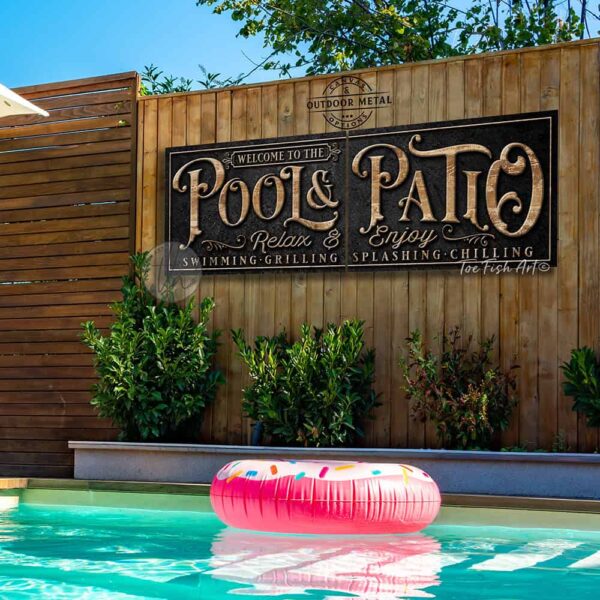 Toe Fish Art's personalized, custom 'Pool & Patio' sign 2-piece set with Family Name and Established Date, featuring a classy vintage slate black design with knotty woodgrain style colored lettering. Available in framed canvas or outdoor waterproof metal print, this large-sized sign adds a unique touch to your outdoor space, perfect for showcasing your family name and date, special message, and popular sayings. This special 2-piece set is huge! – Available in large sizes starting at 10 feet wide! Toe Fish Art's artisan-made outdoor waterproof metal wall decor, expertly made with American-sourced materials. This premium, handcrafted 2-piece set can be customized to fit your style. Built to last with genuine craftsmanship, this lux decor adds high-end cottagecore charm and heritage quality to any space. Made in the USA with durable, authentic materials for a beautiful and meaningful display to last year after year. Modern Farmhouse Cottagecore wall decor handcrafted in durable high-quality outdoor weatherproof solid aluminum metal print, handmade in the USA from start to finish! Beautiful, stylish and timeless wall decor artwork. Handcrafted in the USA by ToeFishArt, and built to last a lifetime by the Toe Fish Art family artisans. This beautiful original artwork adds unique eye-catching decor indoors or outdoors. Perfect for your patio, lanai, deck, veranda, or backyard oasis. This special outdoor decoration is a beautiful reminder of outdoor living. Original, custom, personalized wall decor signs. Canvas, Wood or Metal. Rustic modern farmhouse, cottagecore, vintage, retro, industrial, Americana, primitive, country, coastal, minimalist. Toe Fish Art is a USA small family woman owned business making beautiful decor since 1997.