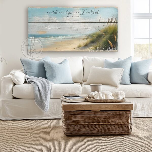 Toe Fish Art's "Be Still and Know that I am God" Christian Faith vintage-inspired painting wall art designed in worn reclaimed wood coastal beach style, depicting the powerful bible verse Psalm 46-10. Rustic country farmhouse meets nautical beach cottage style, handcrafted in durable high-quality canvas or outdoor weatherproof solid aluminum metal, handmade in the USA from start to finish! Beautiful, stylish and timeless coastal cottagecore wall decor painting. Handcrafted in the USA by ToeFishArt, and built to last a lifetime by the Toe Fish Art family artisans. This beautiful original landscape painting of soft aqua blue waves gently lapping the windswept sandy beach dotted with green and gold sea oats adds unique eye-catching decor indoors or outdoors. Add instant outdoor curb appeal to your beach themed home or vacation house! Perfect for your porch, entryway, patio, lanai, deck, veranda, living room, fireplace hearth or mantel, wall hanging or shelf sitter, dining room or bedroom. This painting is a beautiful and inspiring reminder of Christian faith and God's enduring love. Original, custom, personalized wall decor signs. Canvas, Wood or Metal. Rustic modern farmhouse, cottagecore, vintage, retro, industrial, Americana, primitive, country, coastal, minimalist. Toe Fish Art is a USA small family woman owned business making beautiful decor since 1997.