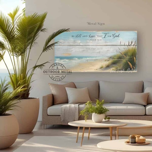 Toe Fish Art's "Be Still and Know that I am God" Christian Faith vintage-inspired painting wall art designed in worn reclaimed wood coastal beach style, depicting the powerful bible verse Psalm 46-10. Rustic country farmhouse meets nautical beach cottage style, handcrafted in durable high-quality canvas or outdoor weatherproof solid aluminum metal, handmade in the USA from start to finish! Beautiful, stylish and timeless coastal cottagecore wall decor painting. Handcrafted in the USA by ToeFishArt, and built to last a lifetime by the Toe Fish Art family artisans. This beautiful original landscape painting of soft aqua blue waves gently lapping the windswept sandy beach dotted with green and gold sea oats adds unique eye-catching decor indoors or outdoors. Add instant outdoor curb appeal to your beach themed home or vacation house! Perfect for your porch, entryway, patio, lanai, deck, veranda, living room, fireplace hearth or mantel, wall hanging or shelf sitter, dining room or bedroom. This painting is a beautiful and inspiring reminder of Christian faith and God's enduring love. Original, custom, personalized wall decor signs. Canvas, Wood or Metal. Rustic modern farmhouse, cottagecore, vintage, retro, industrial, Americana, primitive, country, coastal, minimalist. Toe Fish Art is a USA small family woman owned business making beautiful decor since 1997.
