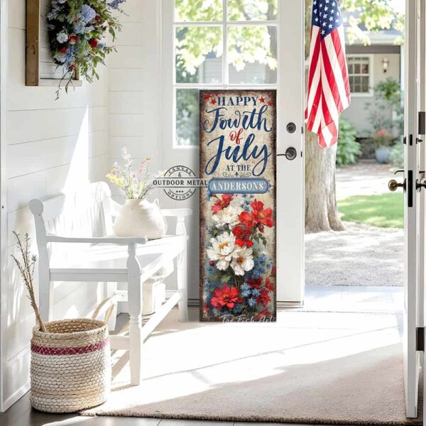 Toe Fish Art's vintage-inspired Personalized Fourth of July sign featuring the artistically hand-lettered design 'Happy Fourth of July at the *Your Family Name*.' Available in canvas or outdoor waterproof metal, this patriotic family name entry door porch greeter sign showcases a vibrant floral painting with red, white, and blue accents, perfect for festive outdoor summer decoration. Perfect for Memorial Day, Independence Day, all summer long, this vertical porch leaner wall art displays a charming rustic cottage farmhouse style, perfect for enhancing your American pride USA themed decor. This artwork is available in framed canvas or outdoor metal, perfect for your porch, entryway, front door, foyer, garden, courtyard, patio, or deck. Nostalgic and festive with a vintage country cottagecore style.–Toe Fish Art's artisan-made framed canvas or outdoor waterproof metal wall decor, expertly made with All-American-sourced materials. This premium, handcrafted piece can be customized to fit your style. Built to last with genuine craftsmanship, this nostalgic, heirloom decor adds rustic charm and heritage quality to any space. Made in the USA with durable, authentic materials for a beautiful and meaningful display to last year after year. Rustic country charm meets Modern Farmhouse Cottagecore wall decor handcrafted in durable high-quality framed canvas or outdoor weatherproof solid aluminum metal, handmade in the USA from start to finish! Beautiful, stylish and timeless wall decor artwork. Handcrafted in the USA by ToeFishArt, and built to last a lifetime by the Toe Fish Art family artisans. This beautiful original artwork adds unique eye-catching decor indoors or outdoors. Add instant outdoor holiday curb appeal to your home! This special summer holiday decoration is a beautiful reminder of summer fun, fireworks, and relaxation. Original, custom, personalized wall decor signs. Canvas, Wood or Metal. Rustic modern farmhouse, cottagecore, vintage, retro, industrial, Americana, primitive, country, coastal, minimalist. Toe Fish Art is a USA small family woman owned business making beautiful decor since 1997.
